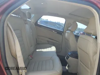 2015 Ford Fusion SE z VIN 3FA6P0H97FR288087, wystawiony jako Copart lot #57446515 z przebiegiem 87 472 mil mil oraz Szkoda całkowita • Salvage title. Historia ofert i sprzedaży dostępna na DreamBid. Obrazek 10.