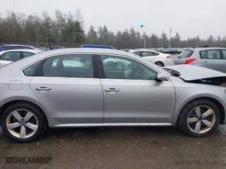2012 Volkswagen Passat SE w/Sunroof with VIN 1VWBP7A35CC081714, listed as a IAAI auction lot 41864409 with 152,603 mi miles. Bid and sale history available at carsss.com. Image 13.
