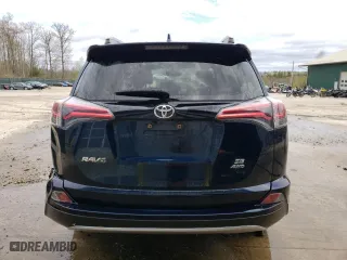 2018 Toyota RAV4 SE with VIN JTMJFREV0JD228148, listed as a Copart auction lot 53595874 with 91,557 mi miles and Salvage Title. Bid and sale history available at carsss.com. Image 6.