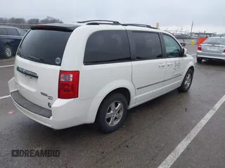 2010 Dodge Grand Caravan SXT with VIN 2D4RN5D1XAR191011, listed as a IAAI auction lot 41162015 with 83,251 mi miles and . Bid and sale history available at DreamBid. Image 4.