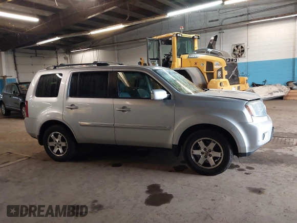 2009 Honda Pilot Touring with VIN 5FNYF48929B010331, listed as a IAAI auction lot 41965094 with 142,490 mi miles and . Bid and sale history available at carsss.com. Image 13.
