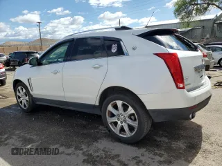 2016 Cadillac SRX Performance Collection with VIN 3GYFNCE35GS575045, listed as a Copart auction lot 57073055 with 72,820 mi miles and Salvage title. Bid and sale history available at DreamBid. Image 2.