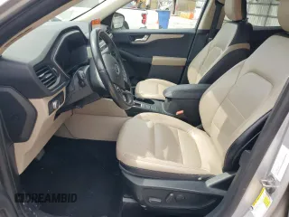 2020 Ford Escape SEL z VIN 1FMCU9H66LUB44403, wystawiony jako Copart lot #57934925 z przebiegiem Nie podano mil oraz Szkoda całkowita • Salvage title. Historia ofert i sprzedaży dostępna na DreamBid. Obrazek 7.