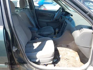2000 Toyota Camry CE z VIN 4T1BG22K9YU931157, wystawiony jako IAAI lot #42370152 z przebiegiem 222 721 mil mil oraz . Historia ofert i sprzedaży dostępna na DreamBid. Obrazek 5.