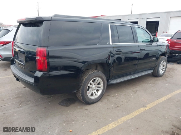 2019 Chevrolet Suburban LT with VIN 1GNSKHKC0KR159583, listed as a IAAI auction lot 41309350 with 196,844 mi miles. Bid and sale history available at carsss.com. Image 4.