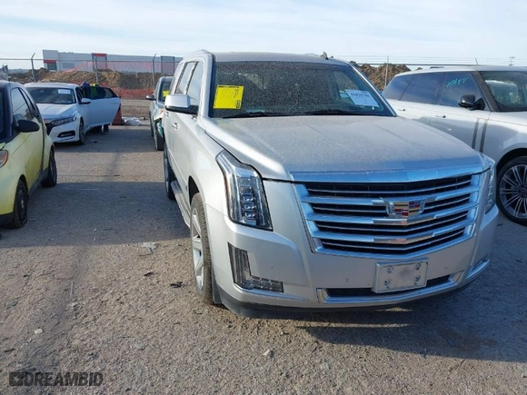 2015 Cadillac Escalade Luxury with VIN 1GYS4BKJ1FR300806, listed as a IAAI auction lot 41816789 with 131,457 mi miles. Bid and sale history available at carsss.com. Image 1.