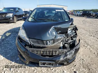 2012 Honda Fit Sport with VIN JHMGE8H52CS003715, listed as a Copart auction lot 63113204 with 79,744 mi miles and Salvage Title. Bid and sale history available at carsss.com. Image 5.