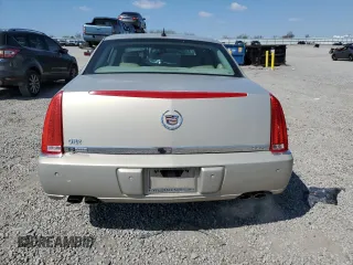 2007 Cadillac DTS Luxury I z VIN 1G6KD57Y37U110200, wystawiony jako Copart lot #52866815 z przebiegiem 157 393 mil mil oraz Szkoda całkowita • Salvage title. Historia ofert i sprzedaży dostępna na DreamBid. Obrazek 6.