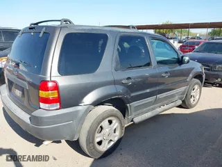 2004 Ford Escape XLT with VIN 1FMCU03134KA96184, listed as a IAAI auction lot 41917091 with 246,067 mi miles. Bid and sale history available at carsss.com. Image 4.
