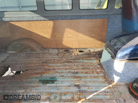 1961 Ford Econoline Cargo with VIN E10SH122862, listed as a Copart auction lot 81049724 with 105,031 mi miles and Salvage Title. Bid and sale history available at DreamBid. Image 11.