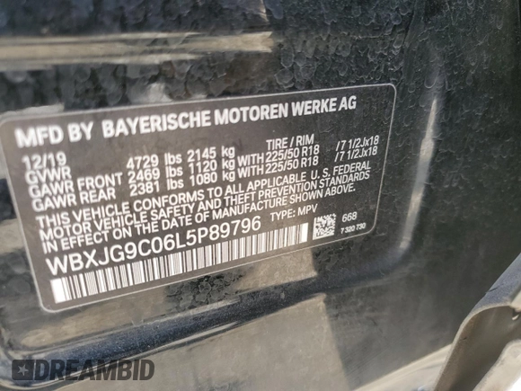 2020 BMW X1 xDrive28i with VIN WBXJG9C06L5P89796, listed as a Copart auction lot 52817235 with 95,665 mi miles and Salvage title. Bid and sale history available at DreamBid. Image 16.