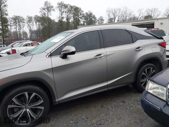 2021 Lexus RX 350 z VIN 2T2HZMAA0MC191675, wystawiony jako IAAI lot #41565196 z przebiegiem 67 490 mil mil oraz . Historia ofert i sprzedaży dostępna na DreamBid. Obrazek 14.