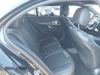 2021 Mercedes-Benz E-Class E 350 with VIN W1KZF8DB0MA889890, listed as a IAAI auction lot 41317094 with 63,075 mi miles. Bid and sale history available at carsss.com. Image 8.