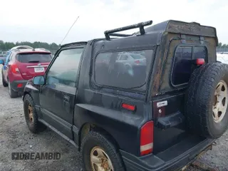 1995 Geo Tracker z VIN 2CNBE18U0S6943292, wystawiony jako IAAI lot #41274067 z przebiegiem Nie podano mil oraz . Historia ofert i sprzedaży dostępna na DreamBid. Obrazek 3.
