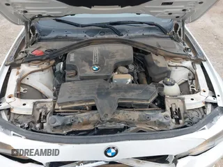 2015 BMW 3 Series 320i with VIN WBA3B1C5XFK140734, listed as a IAAI auction lot 42141319 with 84,863 mi miles and . Bid and sale history available at DreamBid. Image 10.