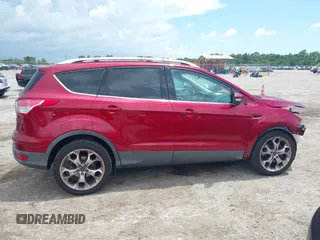 2013 Ford Escape Titanium with VIN 1FMCU0J96DUC67636, listed as a IAAI auction lot 42539425 with 120,593 mi miles and . Bid and sale history available at DreamBid. Image 14.