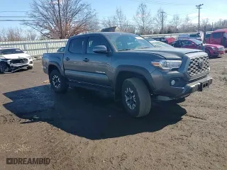 2023 Toyota Tacoma 4WD SR with VIN 3TMCZ5AN5PM552045, listed as a Copart auction lot 46682005 with 20,023 mi miles and Salvage Title. Bid and sale history available at carsss.com. Image 10.