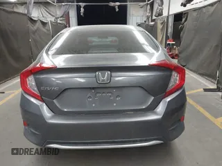2020 Honda Civic LX with VIN 19XFC2F67LE006057, listed as a IAAI auction lot 42032759 with 119,319 mi miles and . Bid and sale history available at DreamBid. Image 17.