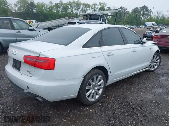 2014 Audi A6 Premium Plus z VIN WAUFGAFC4EN081900, wystawiony jako IAAI lot #42268150 z przebiegiem 150 238 mil mil oraz . Historia ofert i sprzedaży dostępna na DreamBid. Obrazek 4.