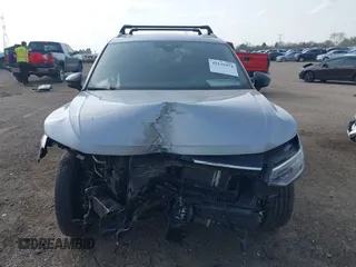 2022 Volkswagen Tiguan SE R-Line Black with VIN 3VV8B7AX7NM030703, listed as a IAAI auction lot 42135974 with 57,116 mi miles and . Bid and sale history available at DreamBid. Image 13.