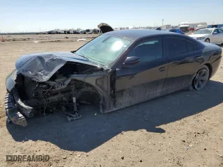 2015 Dodge Charger SXT with VIN 2C3CDXHG3FH726293, listed as a Copart auction lot 48559785 with 118,299 mi miles and Salvage Title. Bid and sale history available at carsss.com. Image 1.