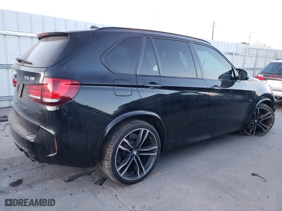 2015 BMW X5 M with VIN 5YMKT6C50F0C89135, listed as a Copart auction lot 84718754 with 105,963 mi miles and Salvage Title. Bid and sale history available at carsss.com. Image 3.