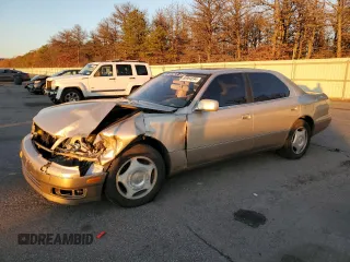 1999 Lexus LS 400 z VIN JT8BH28F5X0141967, wystawiony jako Copart lot #86964694 z przebiegiem 289 168 mil mil oraz Szkoda całkowita • Salvage title. Historia ofert i sprzedaży dostępna na DreamBid. Obrazek 1.