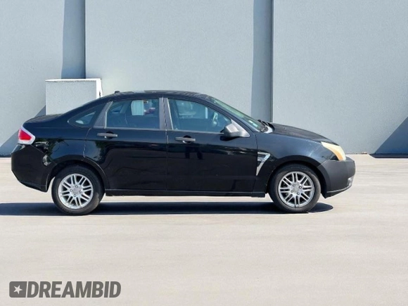 2008 Ford Focus SE with VIN 1FAHP35N28W24058, listed as a Copart auction lot 66020775 with 164,683 mi miles and Clean title. Bid and sale history available at DreamBid. Image 2.
