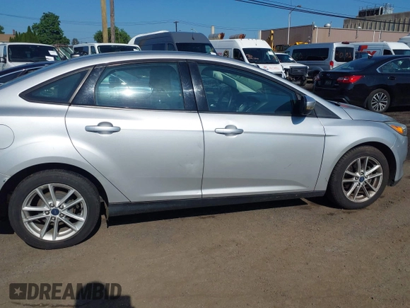 2015 Ford Focus SE with VIN 1FADP3F24FL301732, listed as a IAAI auction lot 42539183 with 127,045 mi miles and . Bid and sale history available at DreamBid. Image 6.