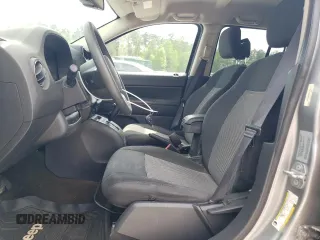 2017 Jeep Compass Sport z VIN 1C4NJCBB9HD117714, wystawiony jako Copart lot #52106065 z przebiegiem 169 246 mil mil oraz Szkoda całkowita • Salvage title. Historia ofert i sprzedaży dostępna na DreamBid. Obrazek 7.