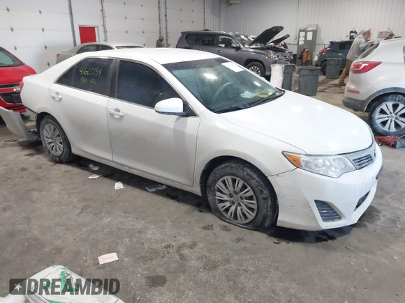 2014 Toyota Camry L with VIN 4T1BF1FK4EU763009, listed as a IAAI auction lot 41615134 with 165,293 mi miles and . Bid and sale history available at carsss.com. Image 1.
