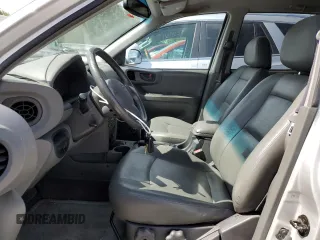 2002 Hyundai Santa Fe GLS with VIN KM8SC13D32U179968, listed as a Copart auction lot 60551434 with 77,676 mi miles and Clean Title. Bid and sale history available at carsss.com. Image 7.