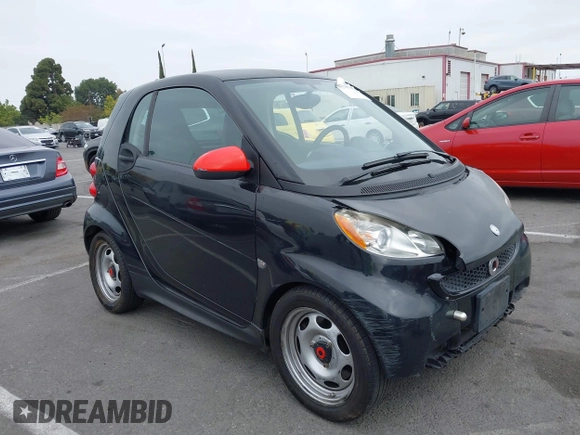 2013 Smart fortwo Pure with VIN WMEEJ3BA1DK651627, listed as a IAAI auction lot 42733791 with 130,561 mi miles and . Bid and sale history available at DreamBid. Image 1.