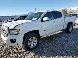 2015 GMC Canyon 4WD SLE with VIN 1GTG6BE32F1185781, listed as a Copart auction lot 79688404 with 199,781 mi miles and Salvage Title. Bid and sale history available at carsss.com. Image 1.