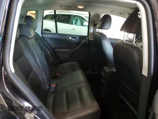 2013 Volkswagen Tiguan SE z VIN WVGBV7AX9DW529234, wystawiony jako Copart lot #41610635 z przebiegiem 130 566 mil mil oraz Szkoda całkowita • Salvage title. Historia ofert i sprzedaży dostępna na DreamBid. Obrazek 11.