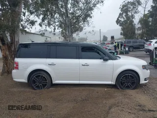 2015 Ford Flex SEL z VIN 2FMGK5C89FBA02548, wystawiony jako IAAI lot #41775436 z przebiegiem 132 856 mil mil oraz . Historia ofert i sprzedaży dostępna na DreamBid. Obrazek 13.