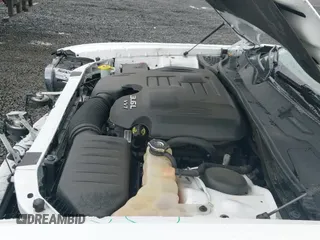 2021 Dodge Challenger SXT z VIN 2C3CDZGG6MH594334, wystawiony jako IAAI lot #41785289 z przebiegiem 65 423 mil mil oraz . Historia ofert i sprzedaży dostępna na DreamBid. Obrazek 20.