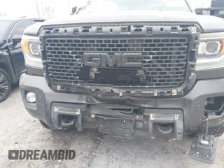 2015 GMC Sierra 2500HD available WiFi Denali with VIN 1GT120E84FF681816, listed as a IAAI auction lot 40967677 with 187,561 mi miles. Bid and sale history available at carsss.com. Image 6.