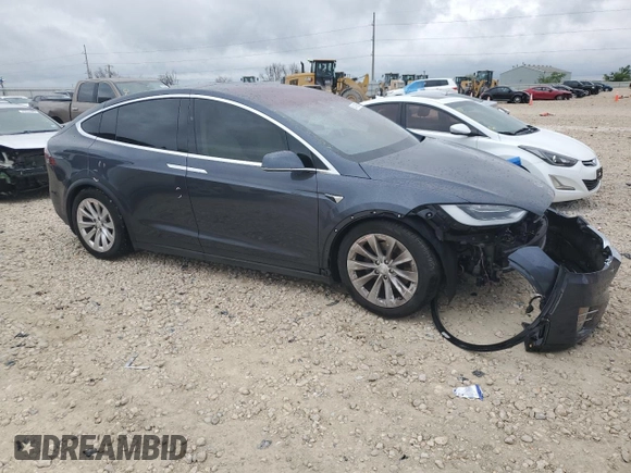 2017 Tesla Model X 90D with VIN 5YJXCBE26HF079246, listed as a Copart auction lot 50141605 with 68,905 mi miles and Salvage Title. Bid and sale history available at DreamBid. Image 4.