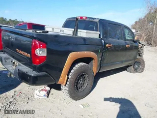 2014 Toyota Tundra 4WD Truck Platinum with VIN 5TFAW5F10EX400395, listed as a IAAI auction lot 41231404 with 152,445 mi miles. Bid and sale history available at carsss.com. Image 4.