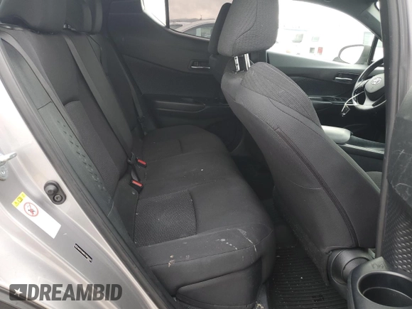 2018 Toyota C-HR XLE z VIN NMTKHMBX3JR023403, wystawiony jako Copart lot #54574245 z przebiegiem 119 657 mil mil oraz Szkoda całkowita • Salvage title. Historia ofert i sprzedaży dostępna na DreamBid. Obrazek 10.