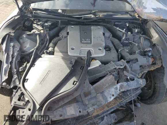 2015 Infiniti Q70 z VIN JN1BY1AP1FM541792, wystawiony jako Copart lot #86699094 z przebiegiem Nie podano mil oraz Szkoda całkowita • Salvage title. Historia ofert i sprzedaży dostępna na DreamBid. Obrazek 11.