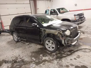 2010 Jeep Compass Sport with VIN 1J4NF4FB0AD501897, listed as a IAAI auction lot 41570009 with 198,376 mi miles. Bid and sale history available at carsss.com. Image 1.