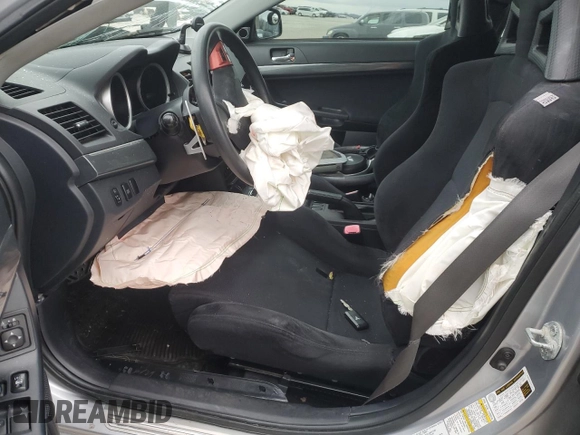 2010 Mitsubishi Lancer with VIN JA32Y6HV9AU002911, listed as a Copart auction lot 83633024 with Not Provided miles and Clean Title. Bid and sale history available at DreamBid. Image 7.