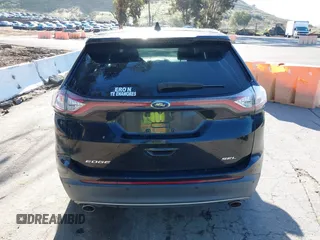 2015 Ford Edge SEL with VIN 2FMTK3J85FBB34115, listed as a IAAI auction lot 41813644 with 143,099 mi miles. Bid and sale history available at carsss.com. Image 16.