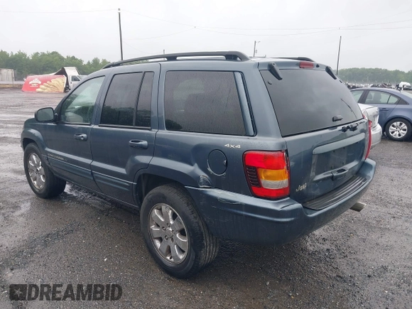 2001 Jeep Grand Cherokee Limited with VIN 1J4GW58S21C673916, listed as a IAAI auction lot 42127522 with Not Provided miles and . Bid and sale history available at DreamBid. Image 3.