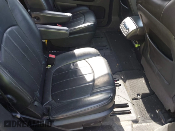 2013 Chevrolet Traverse LTZ z VIN 1GNKVLKD1DJ202428, wystawiony jako IAAI lot #42134820 z przebiegiem 126 532 mil mil oraz . Historia ofert i sprzedaży dostępna na DreamBid. Obrazek 8.