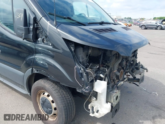 2015 Ford Transit Cargo with VIN 1FTYE1YM9FKA27910, listed as a IAAI auction lot 39414304 with 156,451 mi miles and . Bid and sale history available at DreamBid. Image 13.