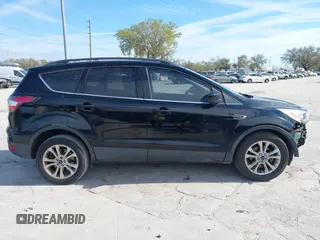 2017 Ford Escape SE with VIN 1FMCU0GDXHUB56573, listed as a IAAI auction lot 41694558 with 145,902 mi miles. Bid and sale history available at carsss.com. Image 14.