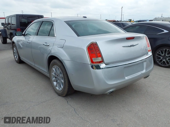 2012 Chrysler 300 Limited with VIN 2C3CCACG9CH223032, listed as a IAAI auction lot 42144147 with 139,625 mi miles. Bid and sale history available at carsss.com. Image 3.